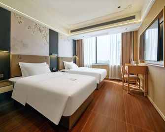 Wohao Hotel - Luoyang - Yatak Odası