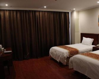 Greentree Inn Wuhan Wuchang Railway Station East Square Business Hotel - Wuhan - Bedroom