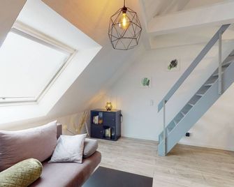 Cozy maisonette apartment near the Teutoburg Forest - Bielefeld - Huiskamer