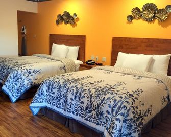 FairBridge Inn & Suites Gateway to Yosemite - Merced - Habitación