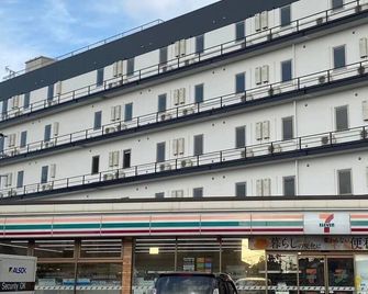 Plaza In Kanku Hotel - Tajiri - Gebäude
