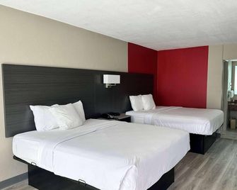 Ramada by Wyndham Cocoa - Cocoa - Ložnice