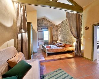 Gîte Pina - Gîte avec piscine partagée - Lussan - Bedroom