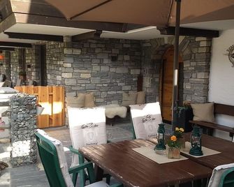 Family room with balcony - Fellner, guest house - Mühlbach am Hochkönig - Restaurant