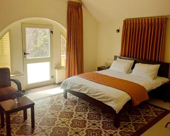 Alhambra Palace Hotel Suites - Ramallah - Ramallah - Slaapkamer