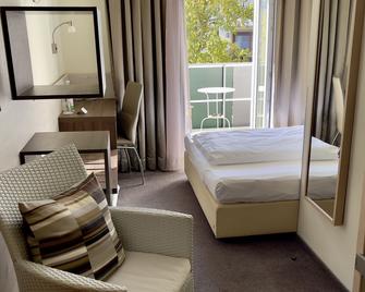 Hotel Central - במברג - חדר שינה