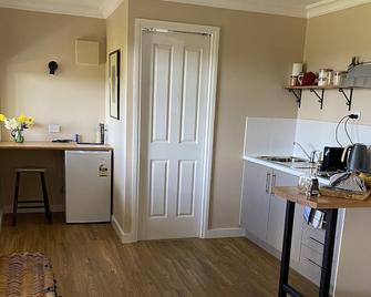 Ironbark cabin, a tranquil romantic getaway between Daylesford and Kyneton.\n - Hepburn Springs - Kitchen