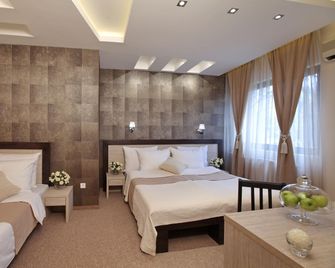 Garni Hotel Vozarev - Belgrado - Habitación