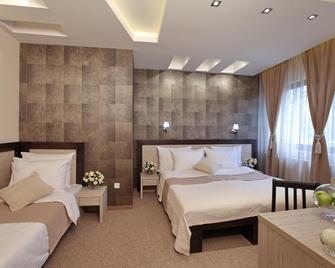 Garni Hotel Vozarev - בלגרד - חדר שינה