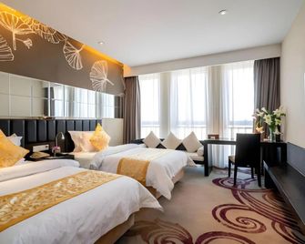 Jinjiang Metropolo Hotel - Taizhou Wanda Plaza - Taizhou - Slaapkamer
