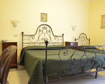 Albergo Il Marzocco - מונטפולצ'אנו - חדר שינה