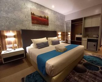 Villa Abadi Resort - Pantai Cenang - Schlafzimmer