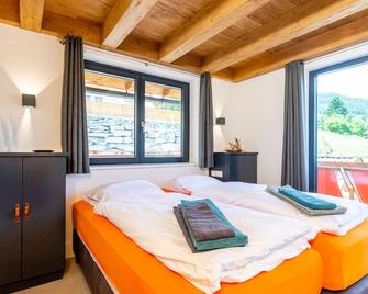 Plushy Holiday Home in Sankt with 2 Saunas & Hot Tubs - Sankt Margarethen im Lungau - Bedroom