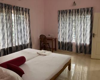 Coral Cove Beach Resort - Varkala - Bedroom