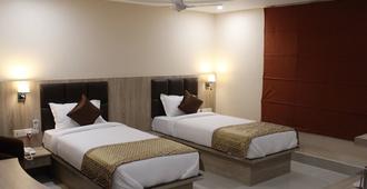 Hotel Royal Heritage - Gauhati - Schlafzimmer