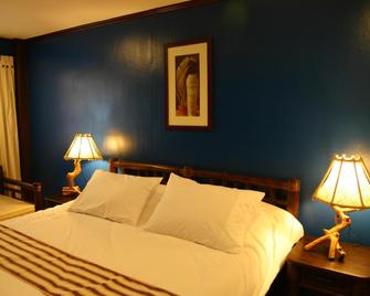 Kuting Reef Resort - Macrohon - Bedroom