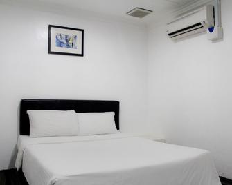 Capital O Ridel Hotel Kota Bharu - Kota Bharu - Soverom