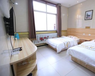 Xinyue Express Hotel - Langfang - Bedroom