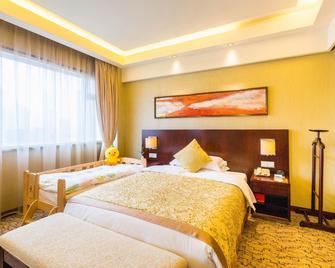 Nanjing Zhongshan Hotel Adjacent Xinjiekou Deji Plaza - Nanjing - Bedroom
