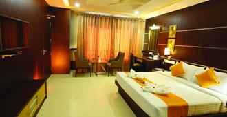 Hotel Virad - Malappuram - Bedroom