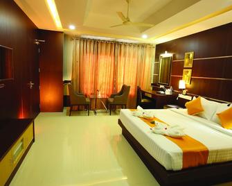 Hotel Virad - Malappuram - Bedroom