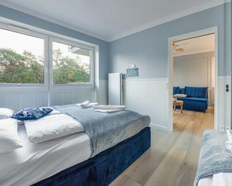 Apartamenty Sun & Snow Wypoczynkowa - Rowy - Sypialnia