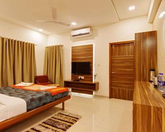 Hotel Woodland - Kolhapur - Camera da letto
