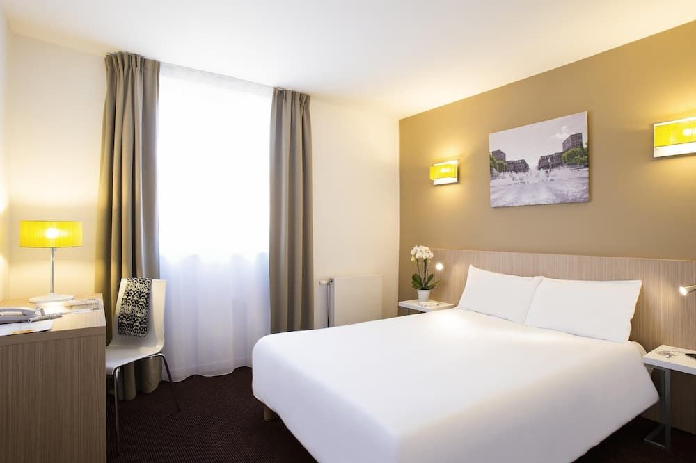 أبارت هوتل أداجيو آكسيس لو هافر ليه دوكس - لو هافر - غرفة نوم