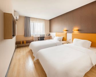 7 Days Premium·Dongguan Houjie Exhibition Centre Shatian - Dongguan - Slaapkamer