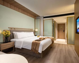 Jinhai International Hotel (Yueyang Tower Pedestrian Street) - Yueyang - Bedroom
