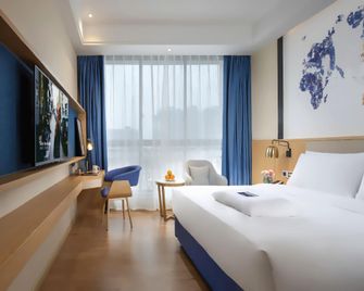 Kyriad Marvelous Hotel Hanzhong High-Speed Railway Station - Hanzhong - Slaapkamer