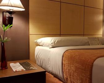 Riviera Mansion Hotel - Manila - Schlafzimmer