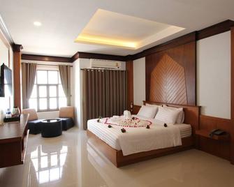 Nonghan Grand Hotel and Resort - Ban Um Chan - Bedroom