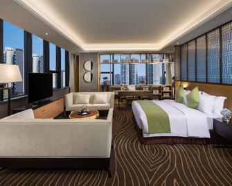 Ramada by Wyndham Leshan - Leshan - Bedroom