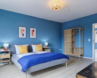 Homiestay am Main mit Dachterrasse zur gemeinschaftlichen Nutzung aller Apartments & Fahrradgarage - Ochsenfurt - Schlafzimmer