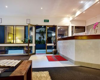 Comfort Inn Premier - קופס הארבור - דלפק קבלה