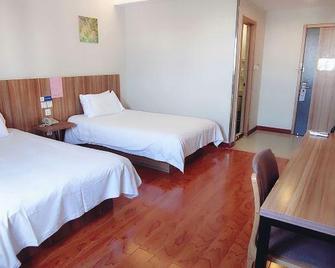 Eaka 365 Hotel Cangzhou Huanghelou Branch - Cangzhou - Habitación