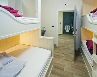 Canolfan Y Fron - Hostel - קרנרפון - חדר שינה