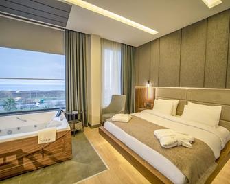 أكسولار هوتل - طرابزون - غرفة نوم