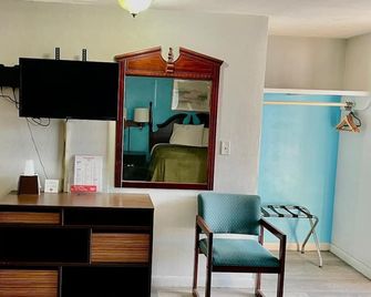 Travelers Inn Olney - Olney - Vybavení pokoje