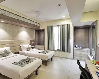 Svasti Inn Jamnagar - Джамнагар - Спальня
