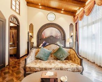 Honglilai Xixili Theme Hotel (Leshan High Speed Railway Station) - Leshan - Slaapkamer