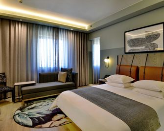Courtyard Hotel Waterfall City - Midrand - Спальня