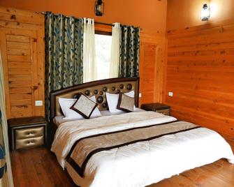 The Canadian Woods Resort - Nainital - Schlafzimmer