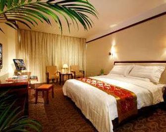 Super 8 by Wyndham Hankou Railway Station - Wuhan - Bedroom