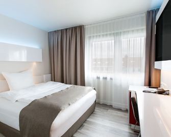 Dormero Hotel Hannover - האנובר - חדר שינה