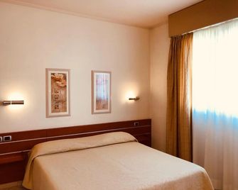 Hotel Delfina - Signa - Schlafzimmer