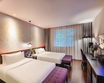 Orange Hotel Nanjing Andermen - נאנז'ינג - חדר שינה