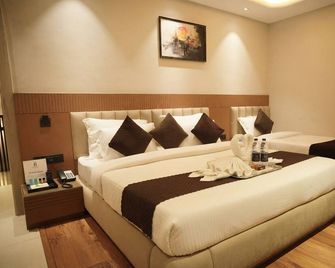 Anant Dhara by Avyanta Hotels - Харідвар - Спальня
