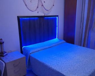 อัฟฟิตตากาเมเร ดา คริส - เรจจิโอ คาลาเบรีย - ห้องนอน